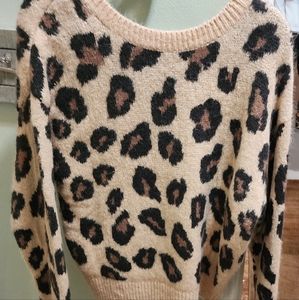 Victoria's Secret cheetah sweater. Tan and black. Low cut back. Fuzzy sweater